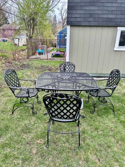 1950’s vintage wrought iron patio set, table size is 41x41, delivery available for extra cost