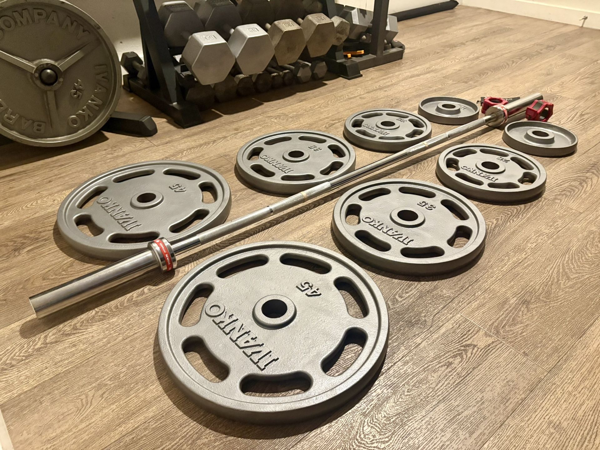 IVANKO’s Olympic Weight Plates (45s, 35s, 25s & 10s) In New Condition; Plus Titan 6ft Bar. Total: 270 lbs.