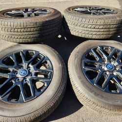 20" Toyota Tundra Sequoia Oem matte black wheels and tires 