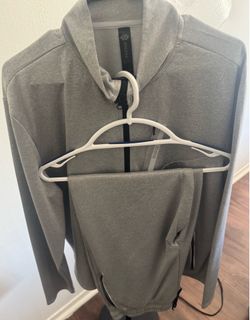 Brand New Men’s “Mozfit” XL Gray Zip Up Top/ Tie Up Bottoms Included.