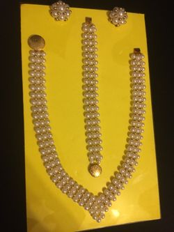 Necklace, bracelet and earrings