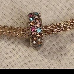 NEW Spacer Charm.  Silver with Multicolored Rhinestones.  Decorative on all sides!  Please see all pictures as part of the description.  Fits all char