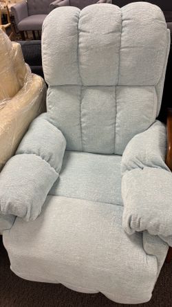 Open box Light blue recliner ( a little dirty) .