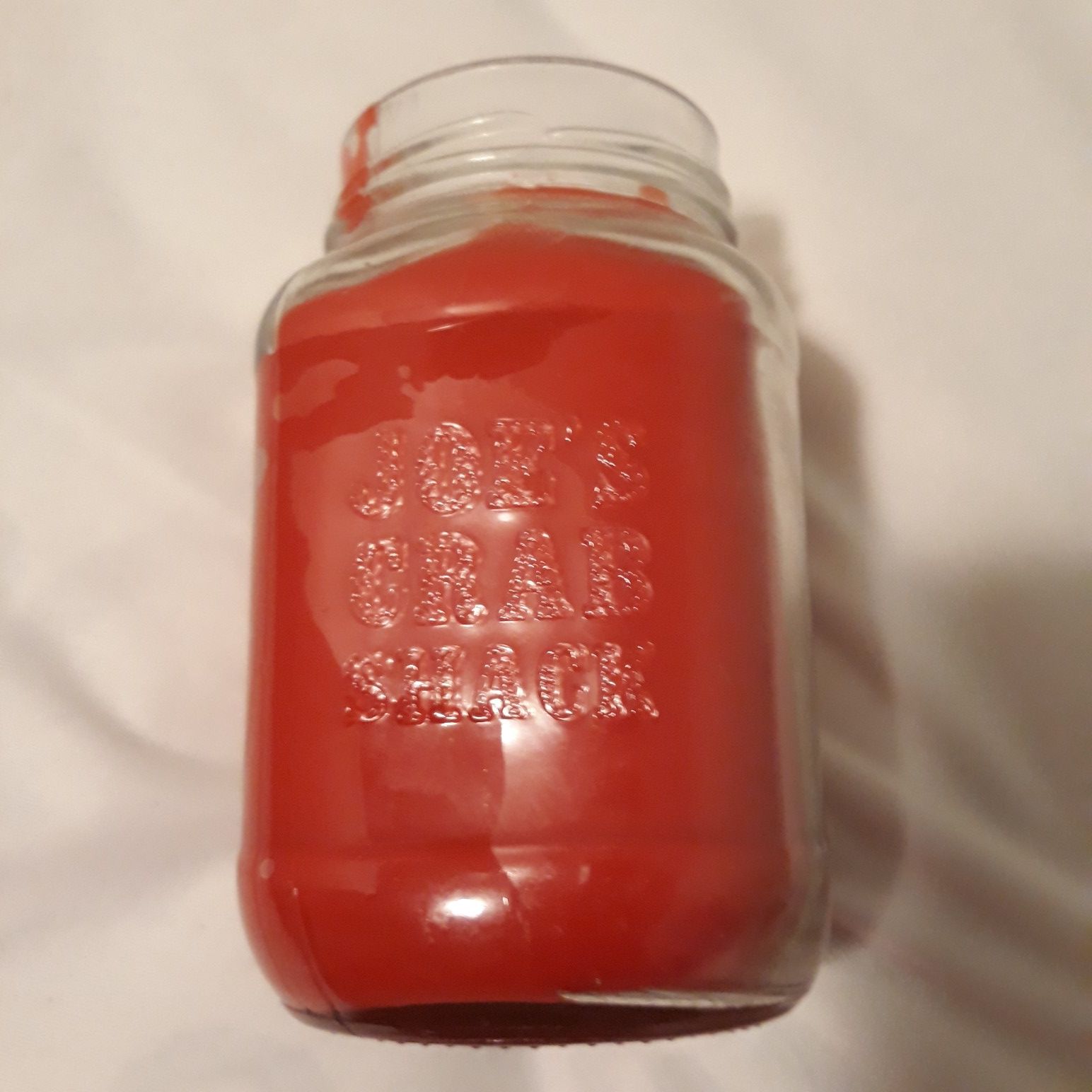 Joe's Crab Shack Mason Jar With Red Wax Inside