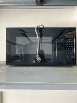 Free microwave on curb. Pick up asap