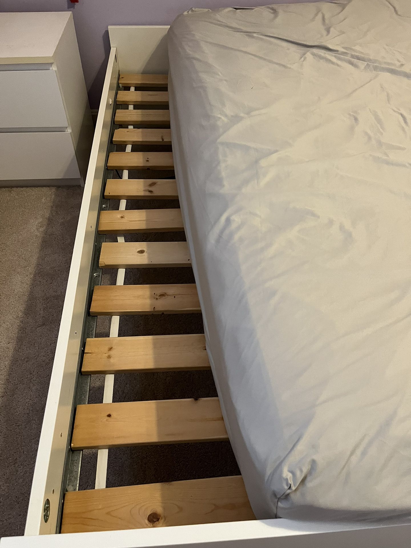 Queen bed (Ikea) with slats and mattress