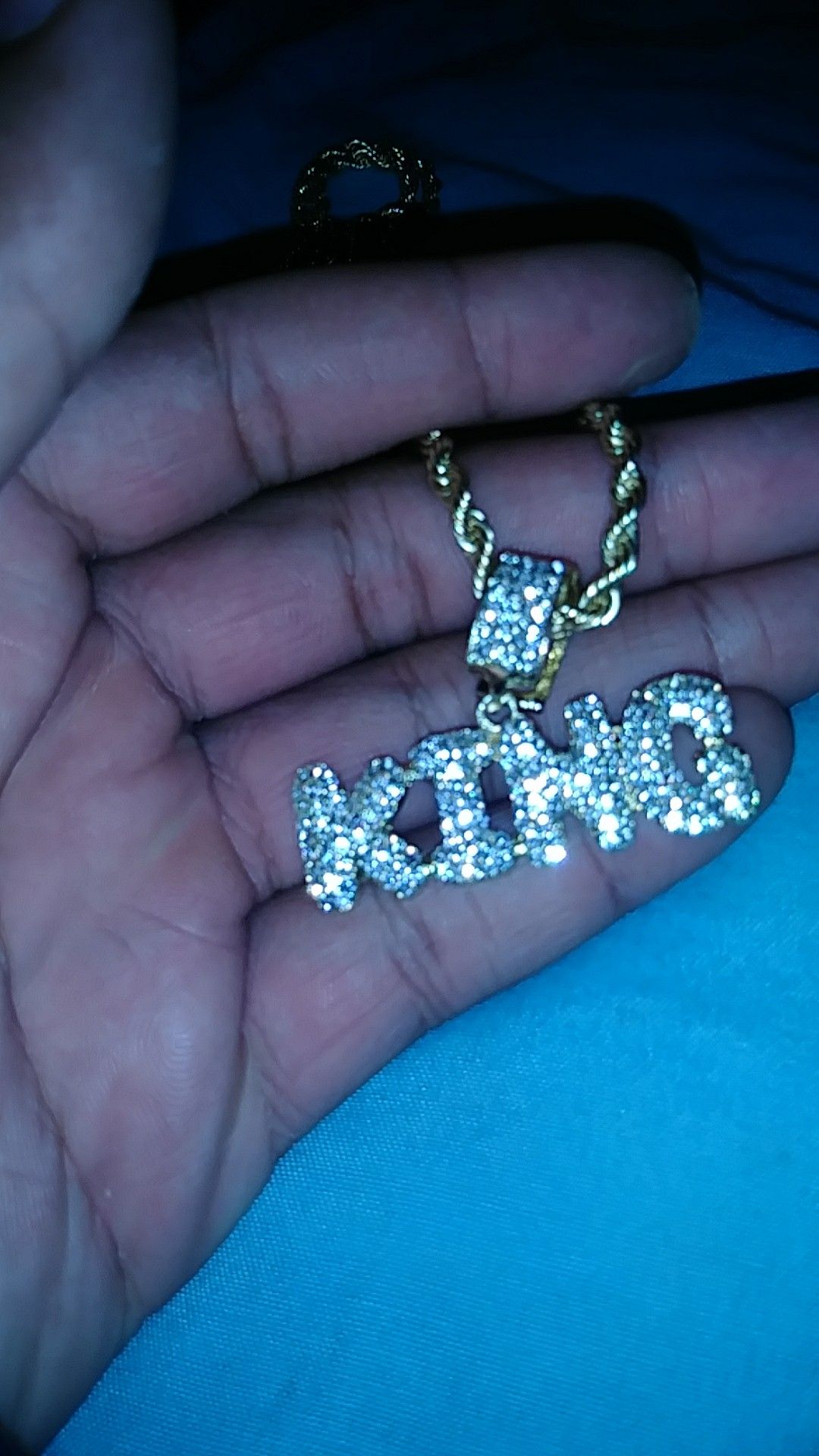 Gold chain with king charm