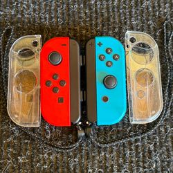 Nintendo Switch Joy Cons Red Blue with Covers & Straps