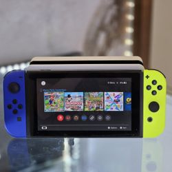 Nintendo Switch - 32 GB - Neon Blue & Yellow Joycons