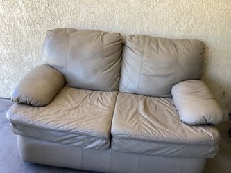 Leather Love seat “Free”