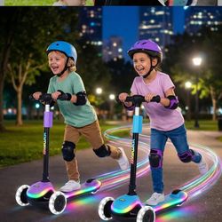 Brand New kids scooter led lights up  teal color.