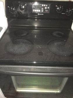 WHIRLPOOL BLACK FLAT TOP STOVE WORKS PERFECT PLUGGED IN DELIVERY EXTRA