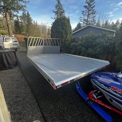 Snowmobiles and  Trailer