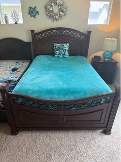 Queen size bed frame solid wood construction.