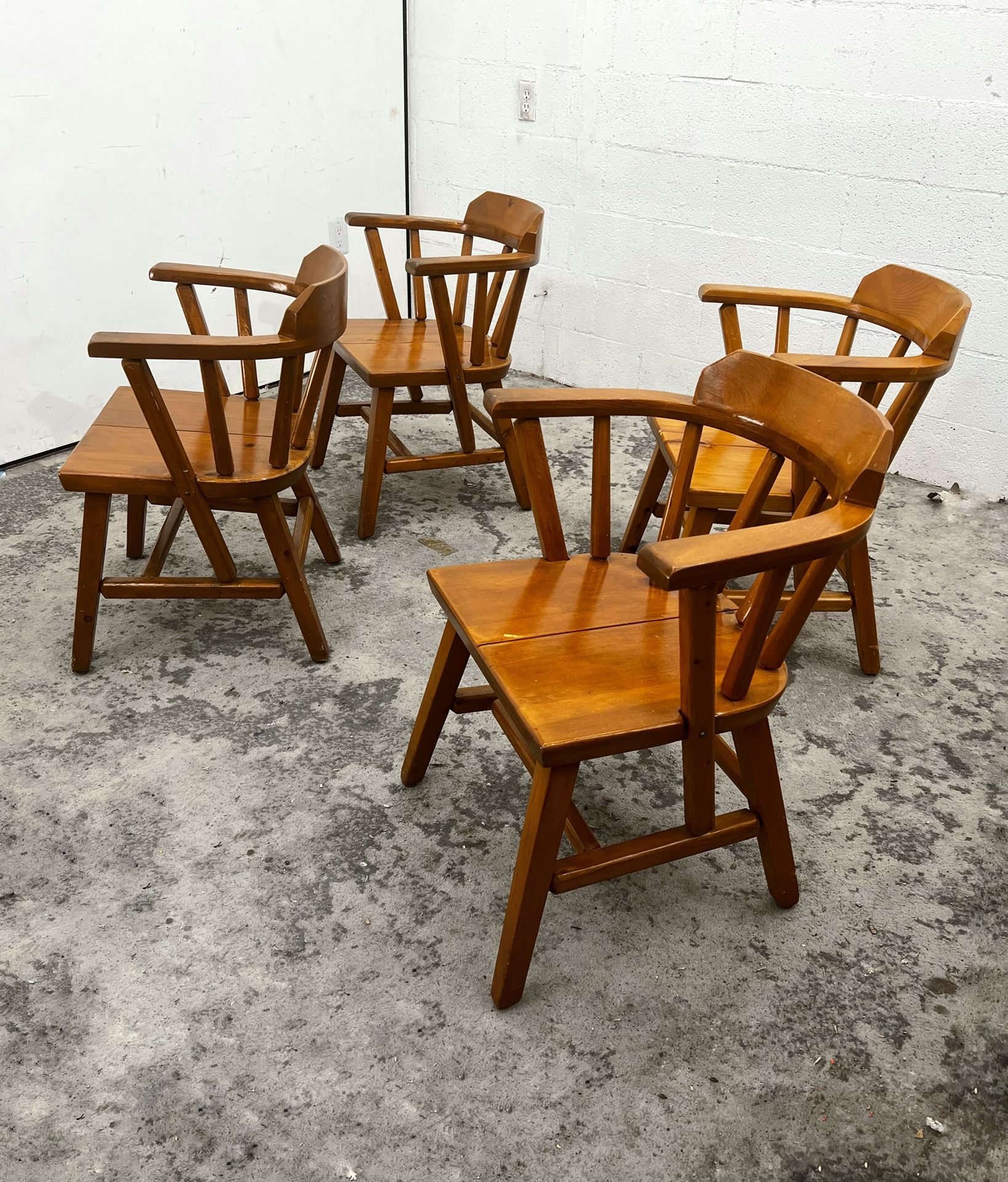 Set of vintage mid century modern arm chairs in solid knotty