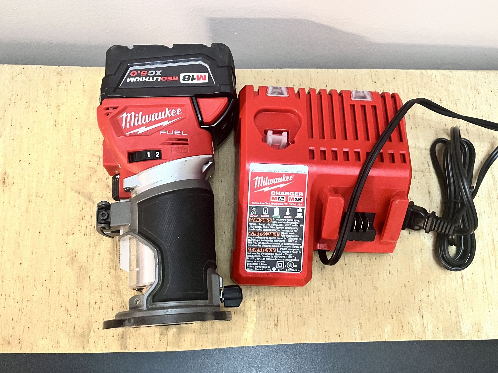Milwaukee Compact router With a 5.0Ah Battery and charger