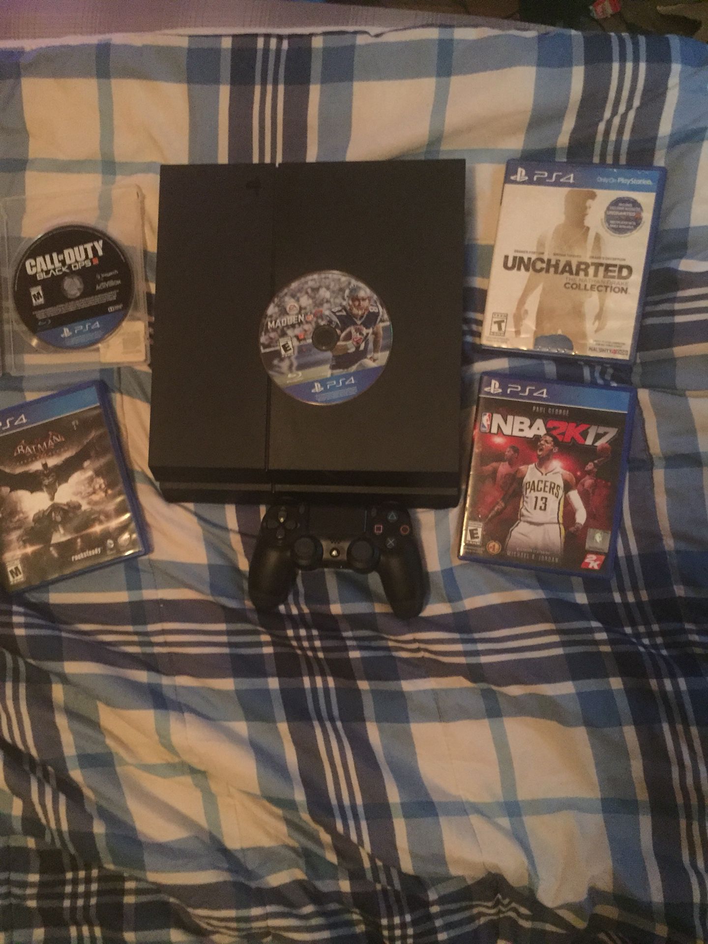Sony PlayStation 4 and a few games... 200 or best offer