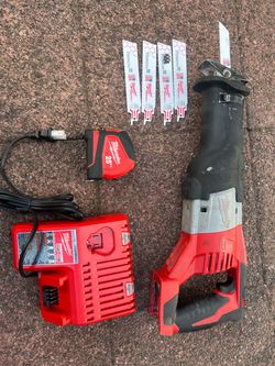 Milwaukee Sawzall and Battery  charger M18