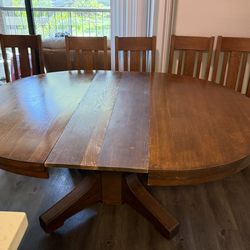 Solid Wood Round Dining Table with Pedestal Base (Seats 4–6)