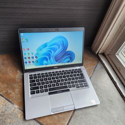 Dell laptop 14 inch i5 8gb ram 256gb ssd with ms office and Adobe Or best offer