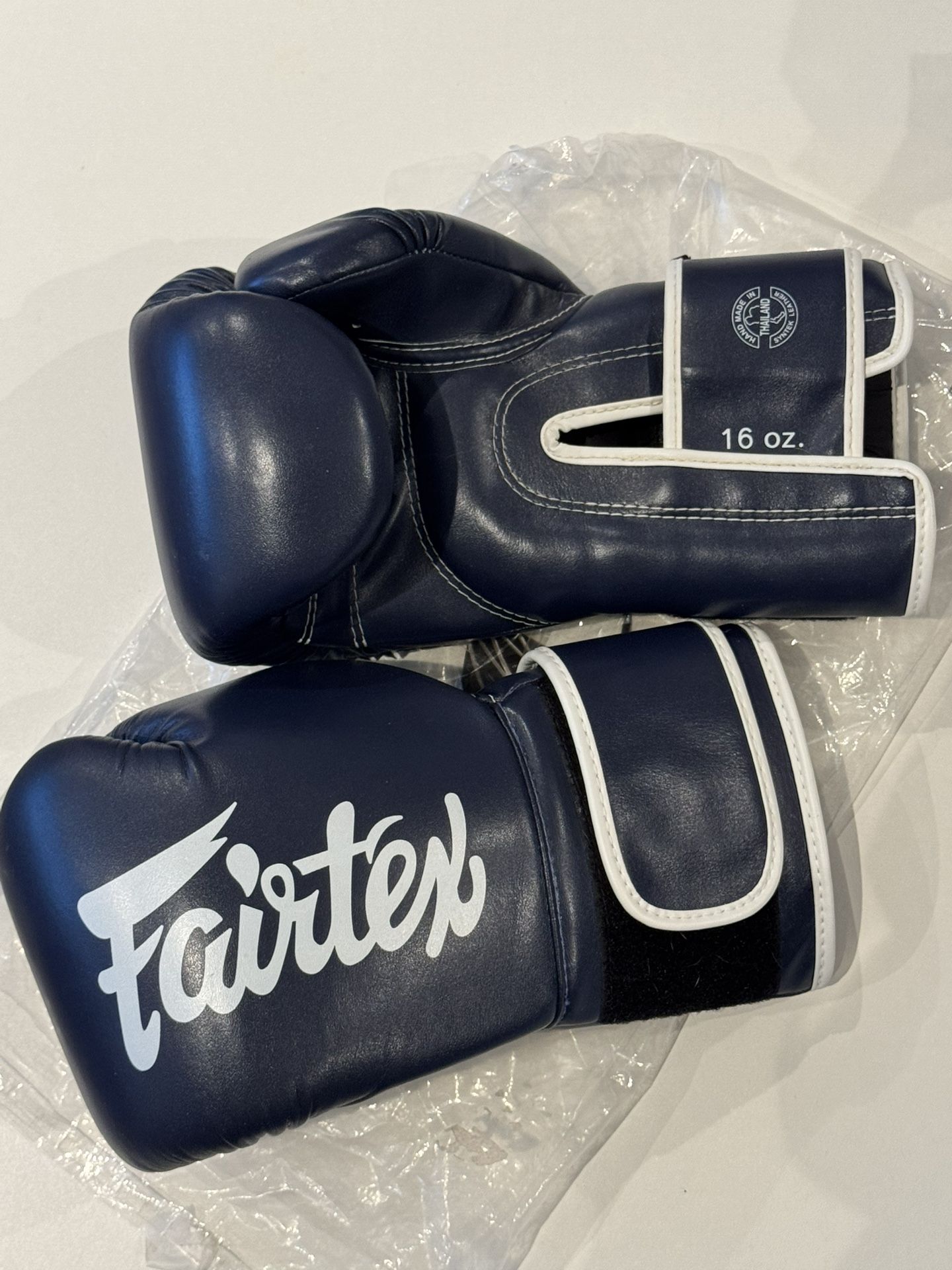 16oz Fairtex boxing gloves (blue with white trim) - Like New