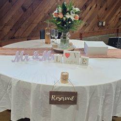 White Tablecloths, Runners, And Chair Sashes