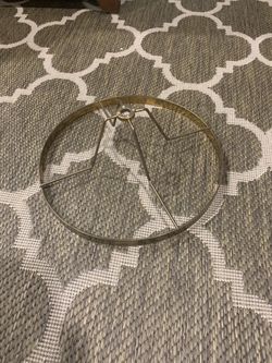 brass-plated metal lamp shade top ring with a spider fitter