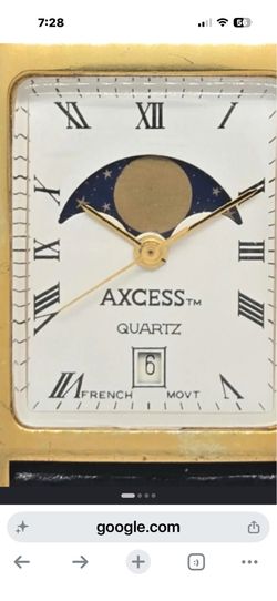 Axcess moonphase  french movement rare . Rare