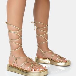 Gold Flat form Sandals Size 9. Brand New 