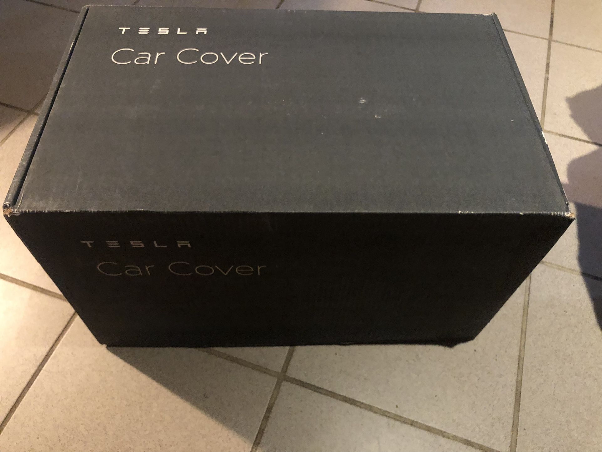 Unopened Tesla Model S Genuine Car Cover 1017723-00-A, new, never used and still in the box