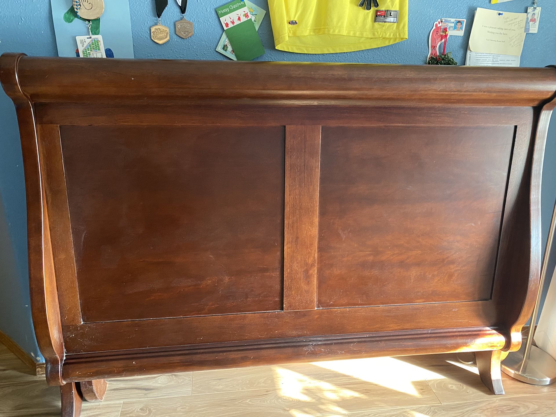 Queen size sleigh bed with box Spring and mattress.