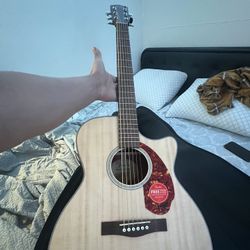 I'm selling my Fender Guittar Model Cc-60sce Santi natural FSR. Shoot Me An Offer.