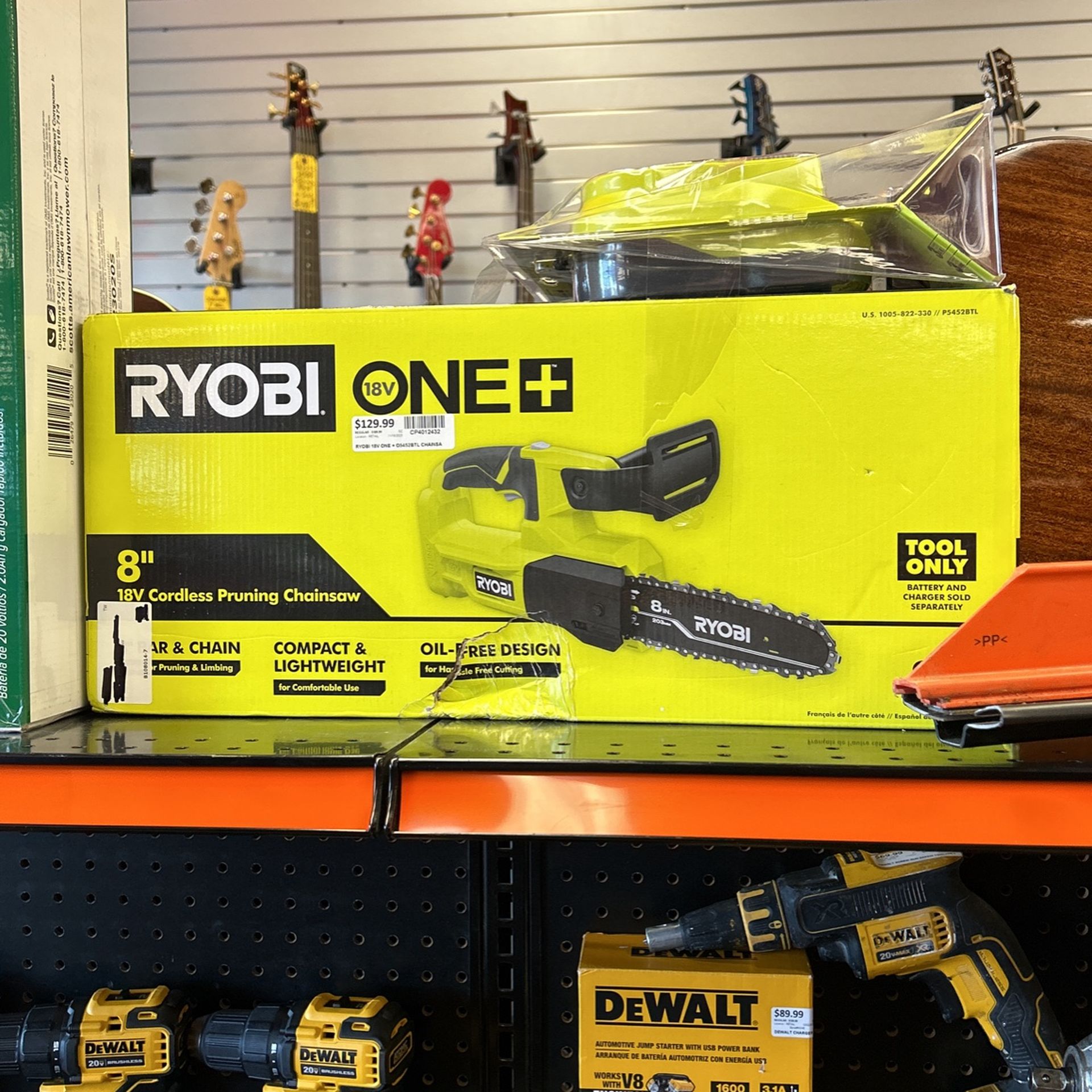 Ryobi 1+8 inch cordless pruning chainsaw, tool battery charger, new inbox