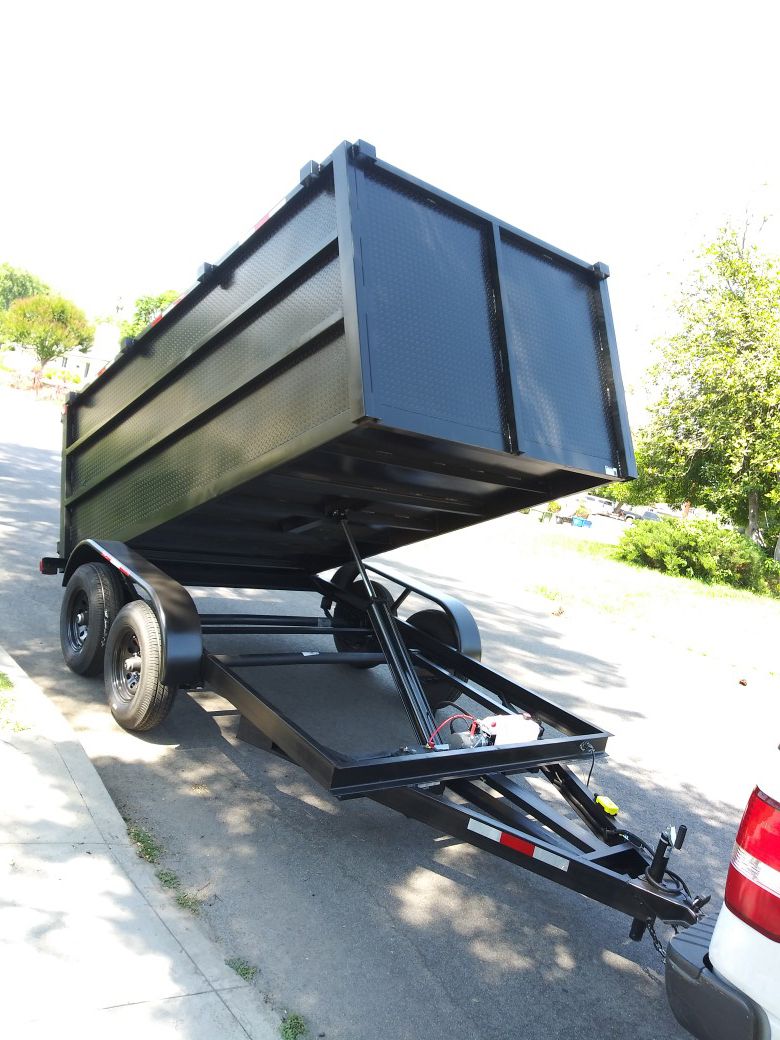 BRAND NEW DUMP TRAILER8X12X4 HEAVY DUTY, ELECTRIC BRAKES, LIGHTS, HYDRAULIC SYSTEM, REMOTE CONTROL,12000 LBS WITH TITLE IN HAND