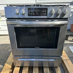 Whirlpool Fridge and Frigidaire free standing gas range for sale.