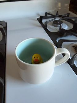 White Ceramic Mug with Hidden Duck Figure