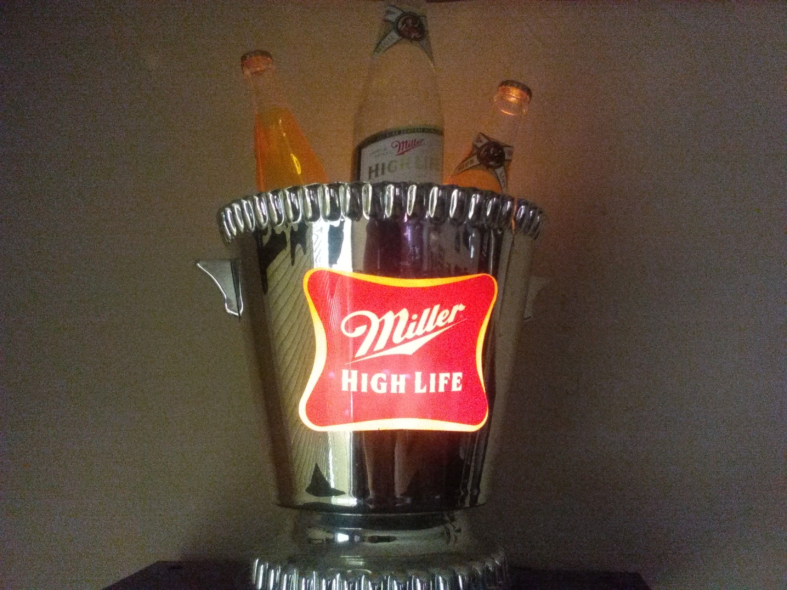 Miller light n disco ball n green cop light