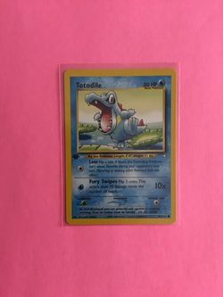 1st edition Totodile 81/111 Pokemon Card from Neo Genesis Set