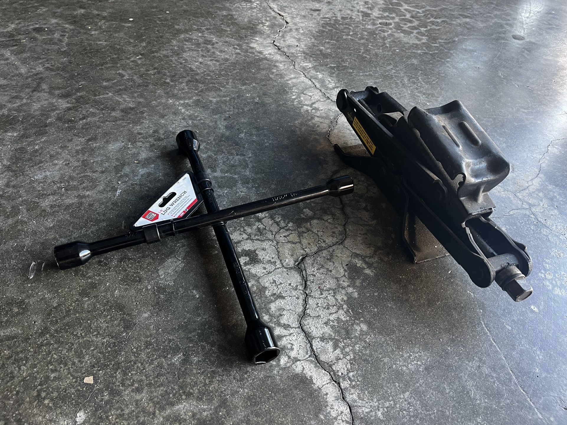 Lug Wrench And Car Jack