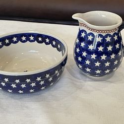 Boleslawiec Polish pottery bowl and creamer pitcher with a blue and white star pattern.