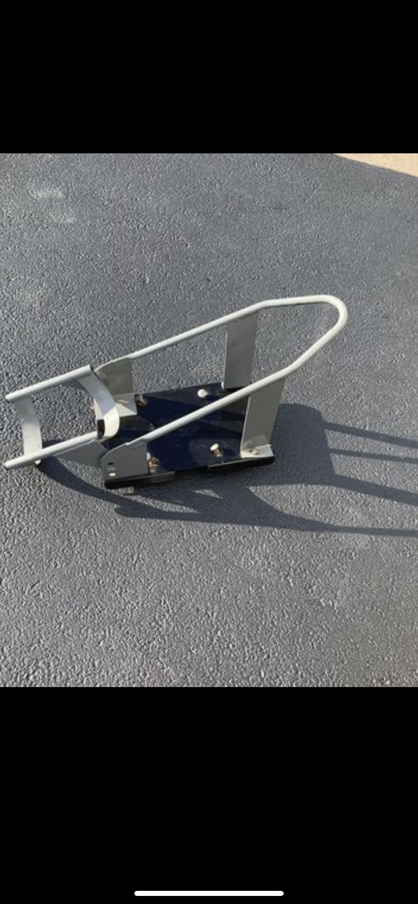 Motor cycle bracket for trailer it’s aluminum and very nice