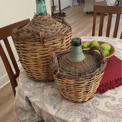 Antique Wine Bottles In Basket