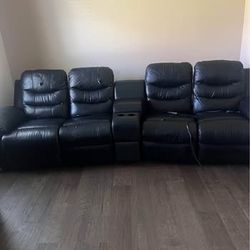 Black Leather Reclining Motion Sofa With Cup Holder And Storage 