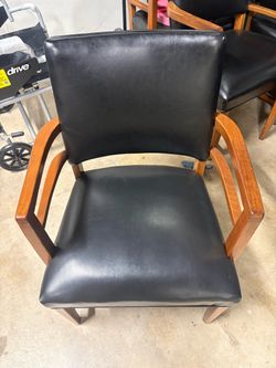 Black leather arm chairs