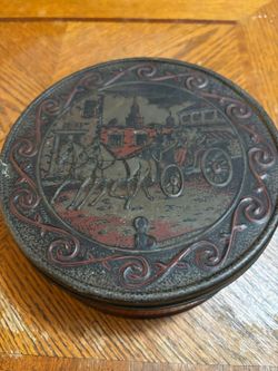 vintage fruit cake tin with chess pieces