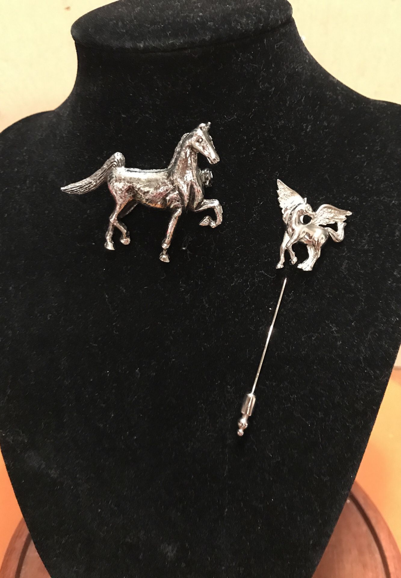 Two Silver Horse pins