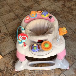 Storkcraft 3-in-1 Activity Walker and Rocker with Jumping Board and Feeding Tray, Interactive Walker for Toddlers and Infants, Pink