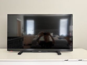 Insignia Flat Screen TV with Stand