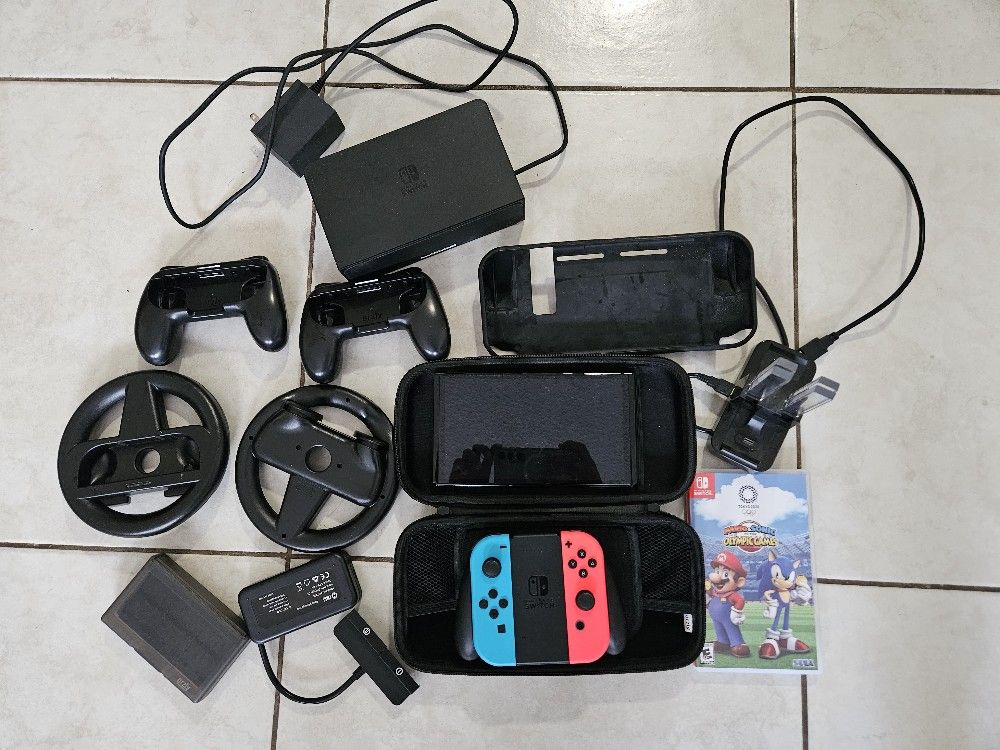 Nintendo Switch OLED ( Never Used)