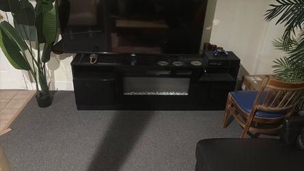 Tv stand with built in fire place